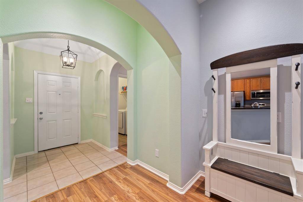 Front entry and foyer with it's architectural arches.