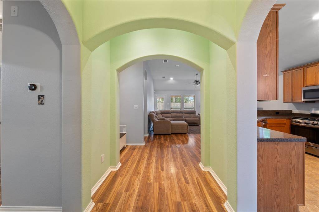 Following the floorplan from the front entryway, to the right is the dining room and kitchen.