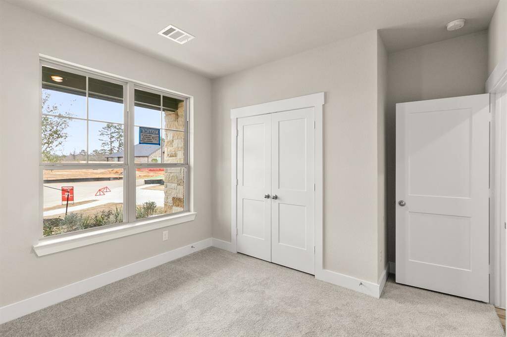 In this home, the secondary bedrooms are not just additional spaces; they’re integral parts of a lifestyle where comfort and style blend seamlessly. It’s where memories will be made, dreams will be nurtured, and everyone will feel right at home.