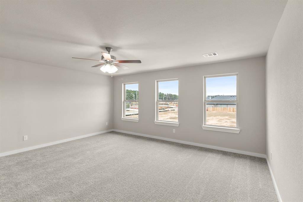 For this abundantly sized game room, picture oversized sofas that cradle you as you dive into your favorite board games, or a sleek pool table that becomes the centerpiece of friendly competitions.