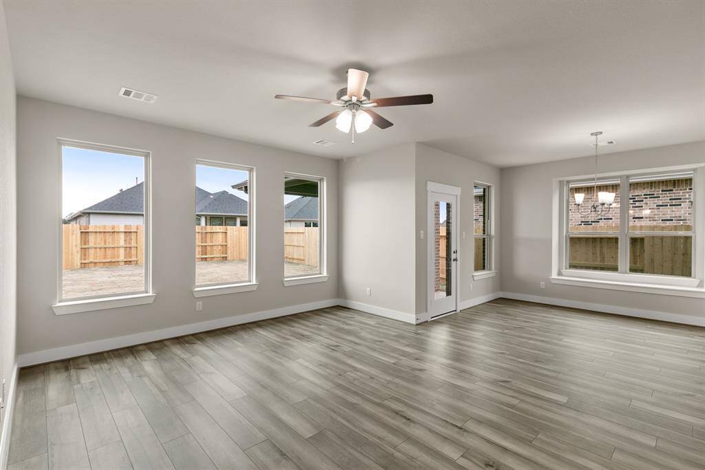 As you wander through the open floor plan, you’ll notice high ceilings that elevate the ambiance, while carefully chosen materials add a touch of luxury without losing that cozy feel.