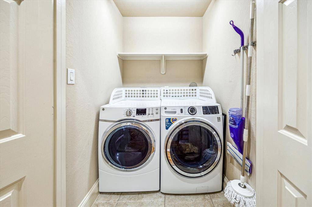 Spacious utility room on lower level.