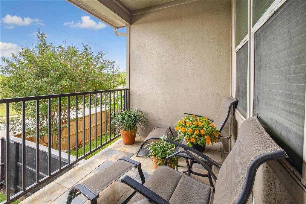 Back balcony off of kitchen over backyard.