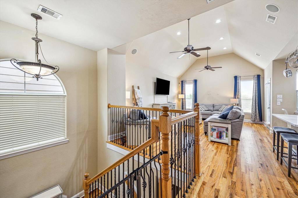Spacious entryway with room for a hall tree. Go down to the garage, utility room full bath and two bedrooms.