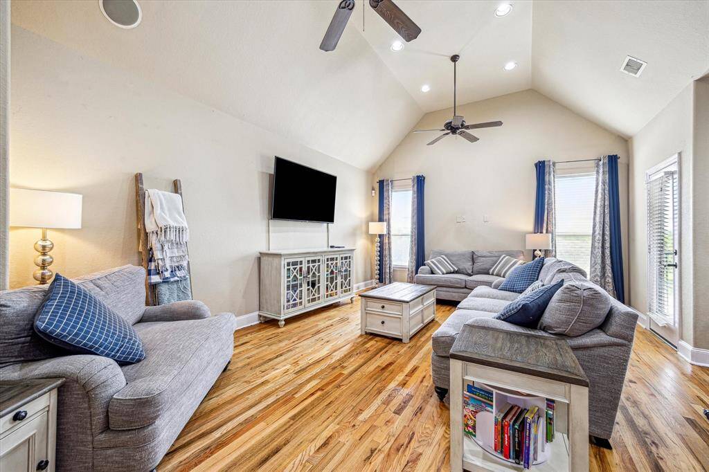 Large family room opens to kitchen/breakfast area. High ceilings and beautiful hardwoods.