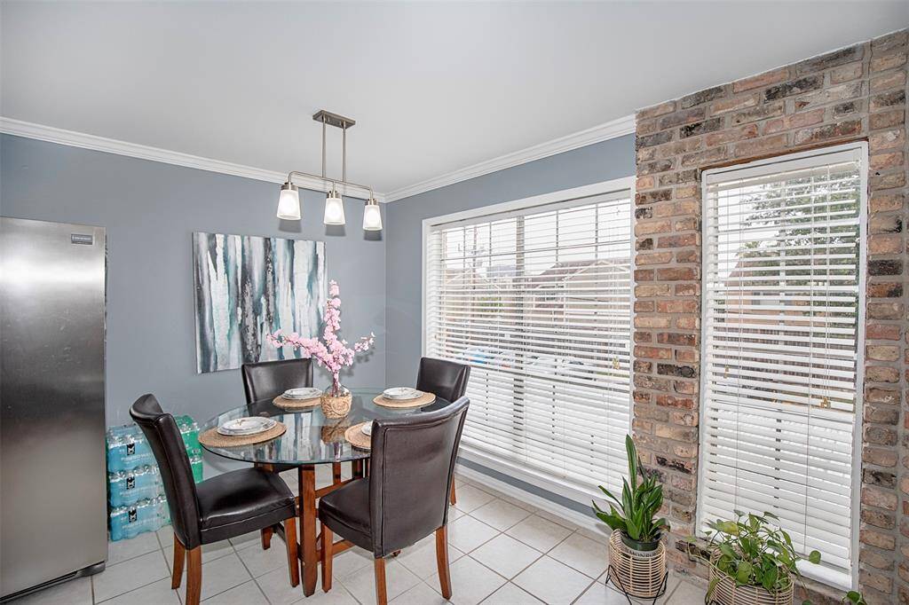 A stylish light fixture adds a touch of elegance overhead.