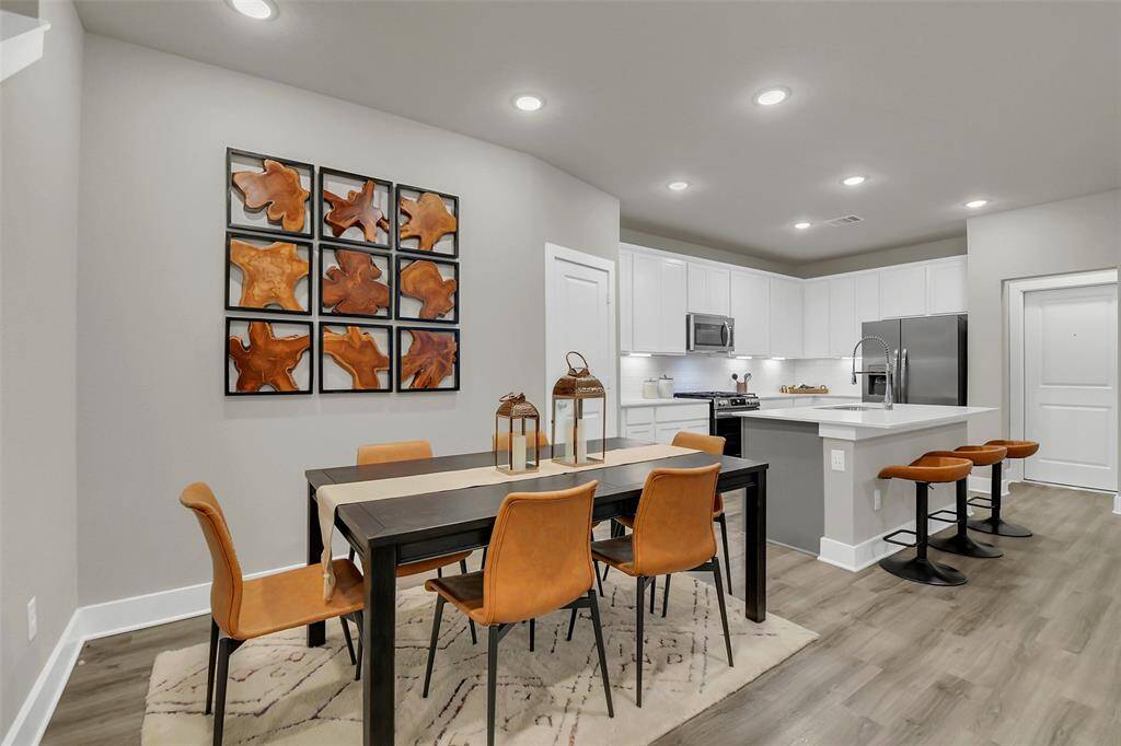 Great dining area connected to kitchen. Opens into the living room for great entertaining!