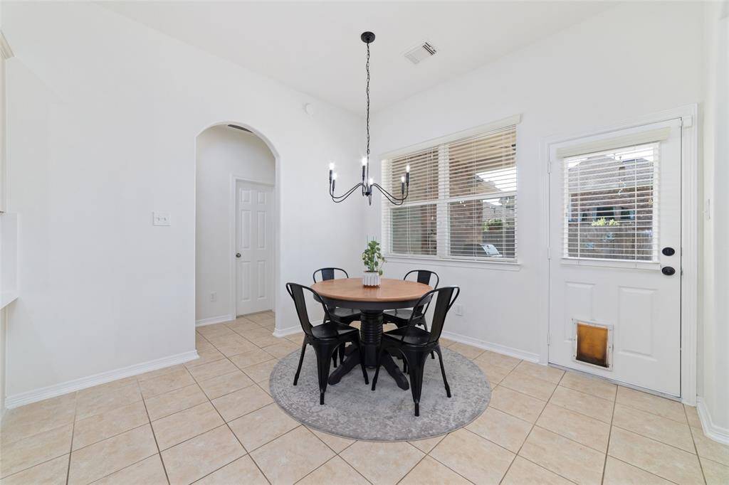 The breakfast room is just off the living room and open to the kitchen.