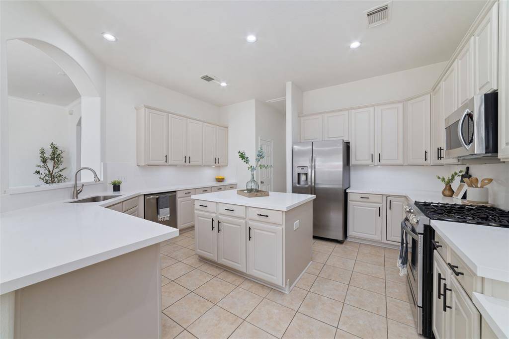 Another view of the spacious, updated kitchen.