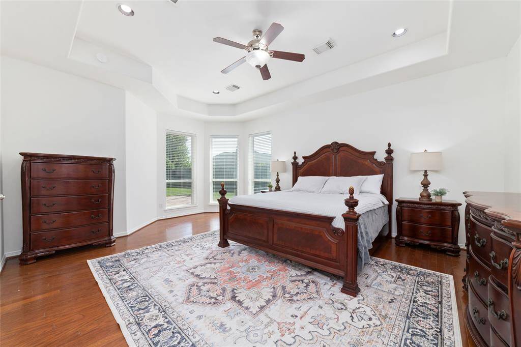 Another view of the primary bedroom.