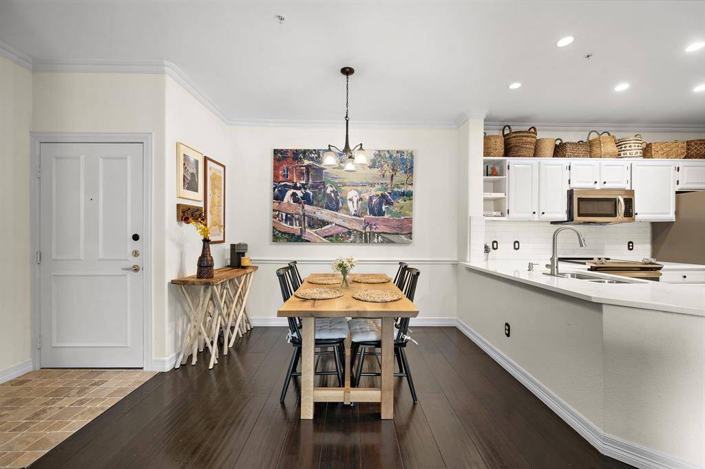 Enjoy the company of your friends and loved ones in the dining area that features bamboo flooring, easy access to the kitchen, and ample space that can easily seat a large group.