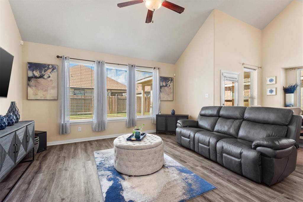 Ceiling fans and wood like flooring.