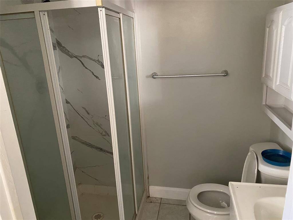 Bathroom in extra room behind garage