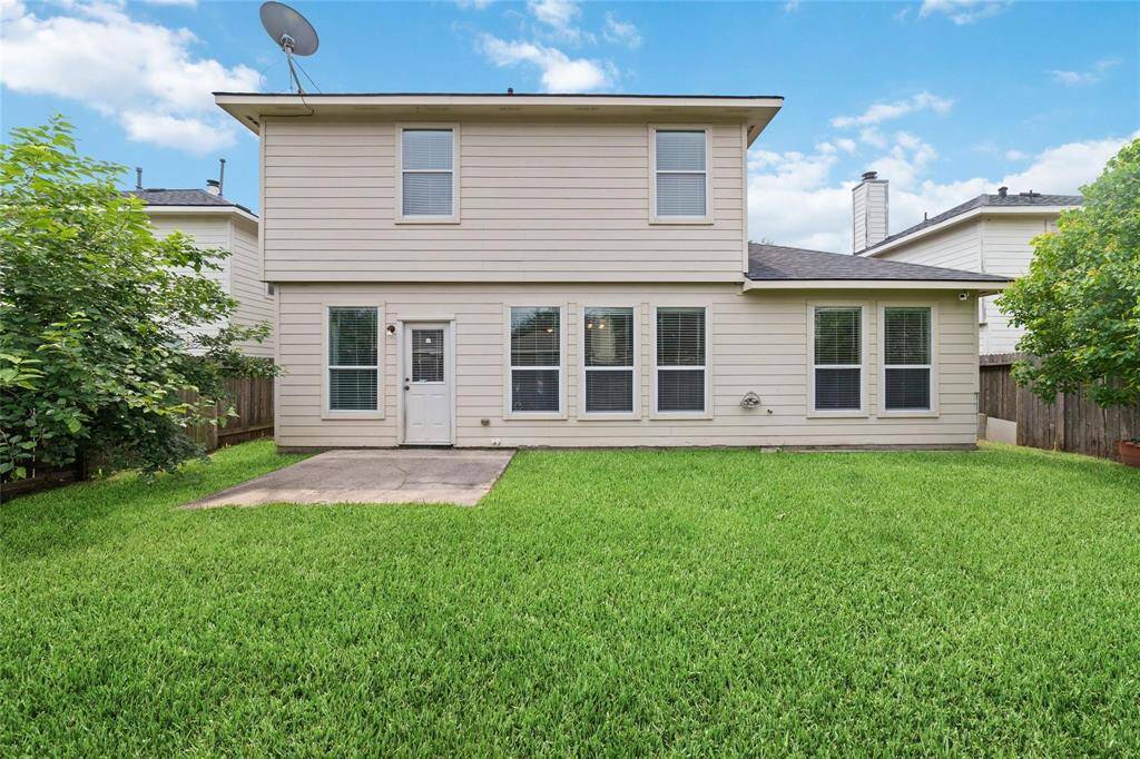 Back of Home showing yard