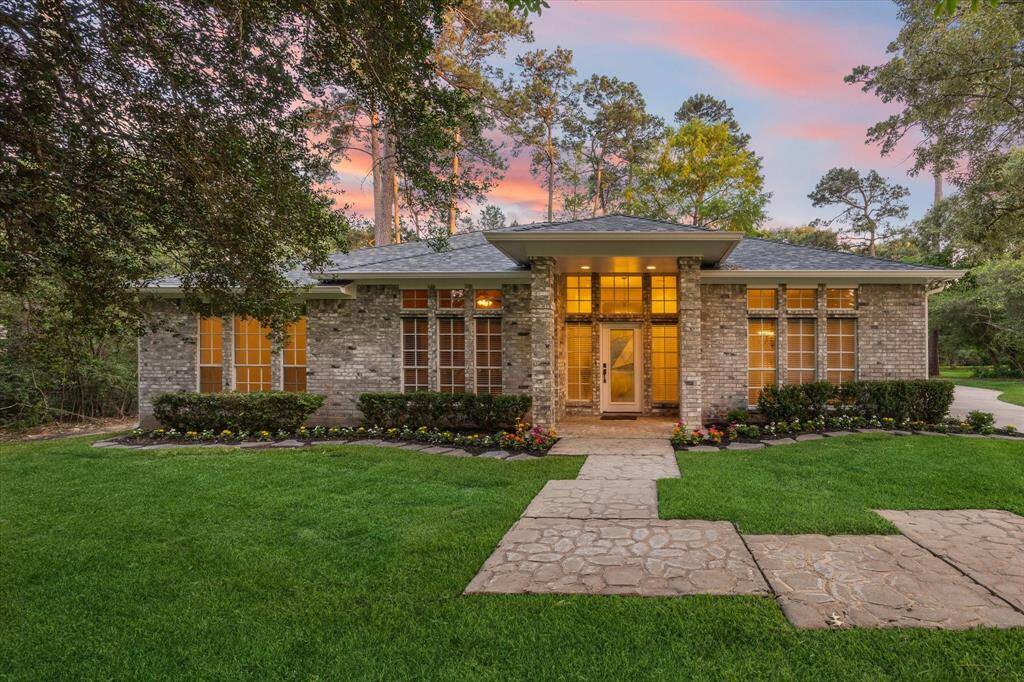 Front of Home, driveway to the right.