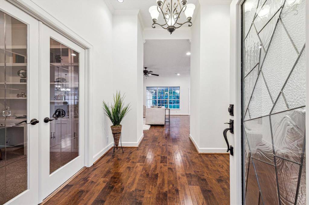 Stepping in from the front door study on the left, formal dining on the right.