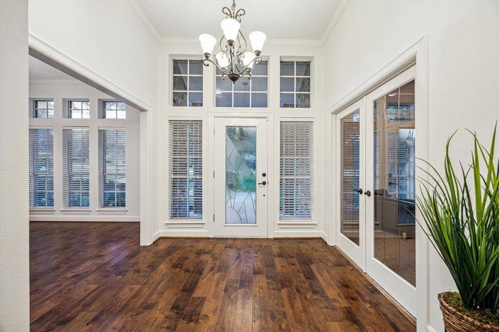 From the inside looking at the entryway and front door.