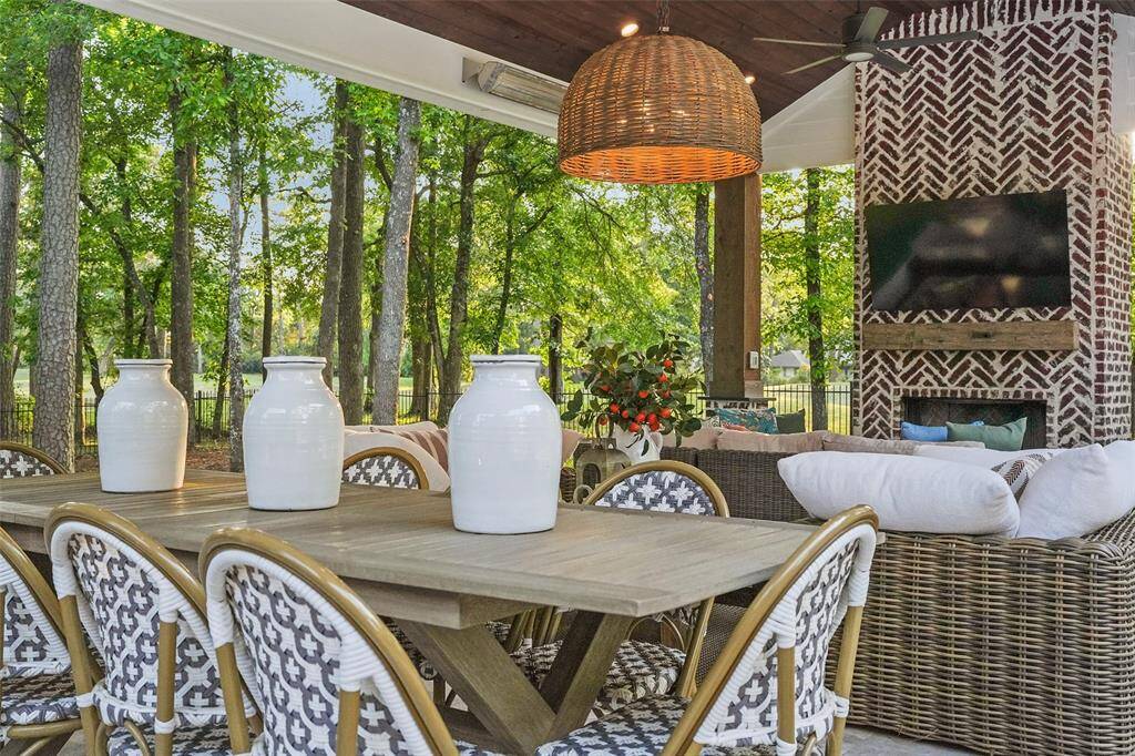 Outdoor Kitchen with Vaulted ceilings, fireplace and Infrared heaters