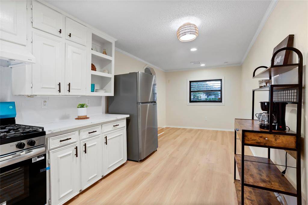new fridge, quartz countertops, new lighting