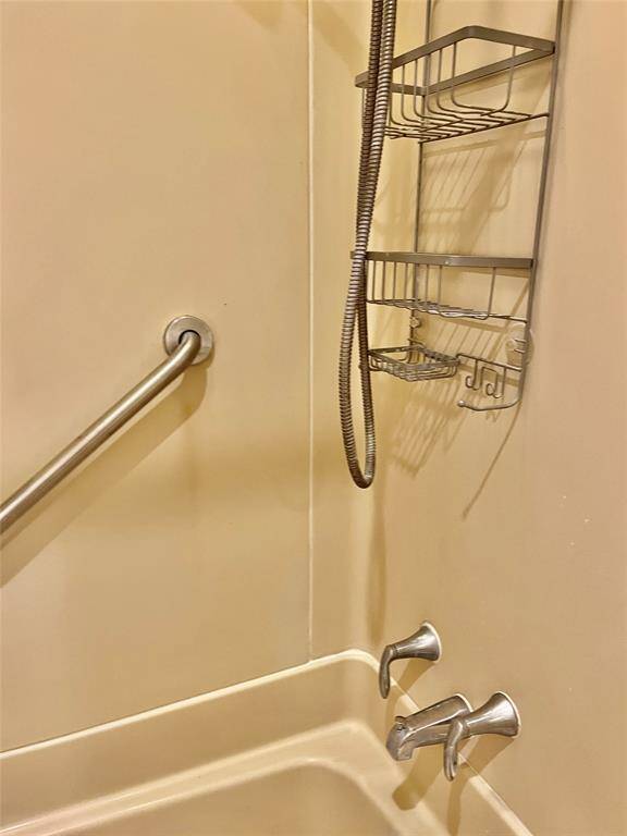 Shelves in tub area for storing everyday necessities