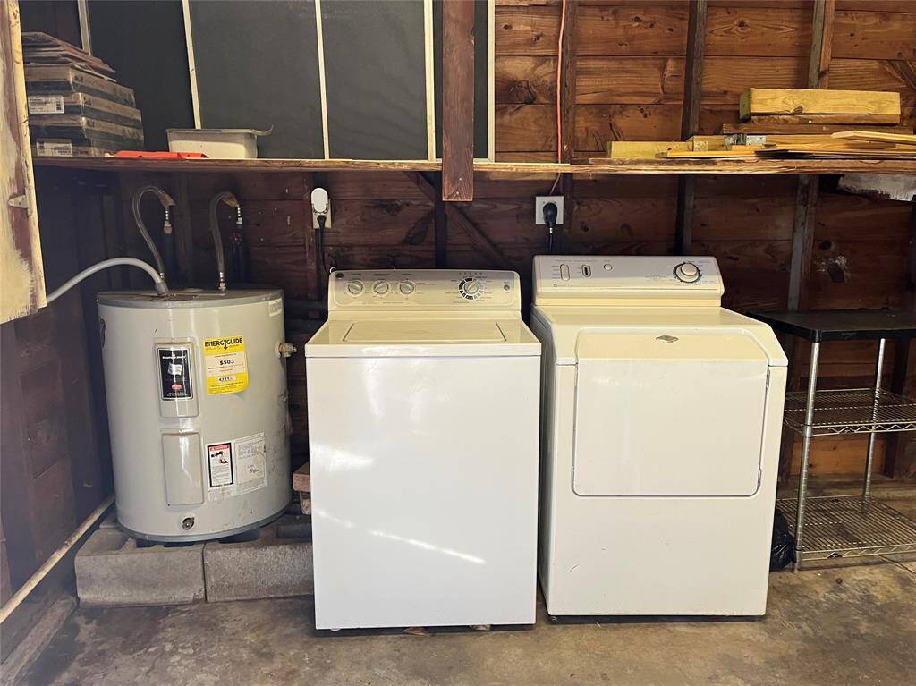 The washing machine and dryer are included, and the extra water heater, as well.  The garage is large enough for two medium cars and the there is an automatic garage door opener.