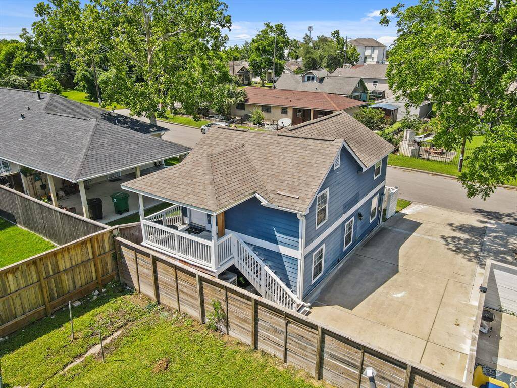 modern, open-concept living area with a cozy seating arrangement, sleek kitchen, and dining nook. The space features neutral tones, stainless steel appliances, and stylish decor, offering a welcoming and functional layout ideal for contemporary living.