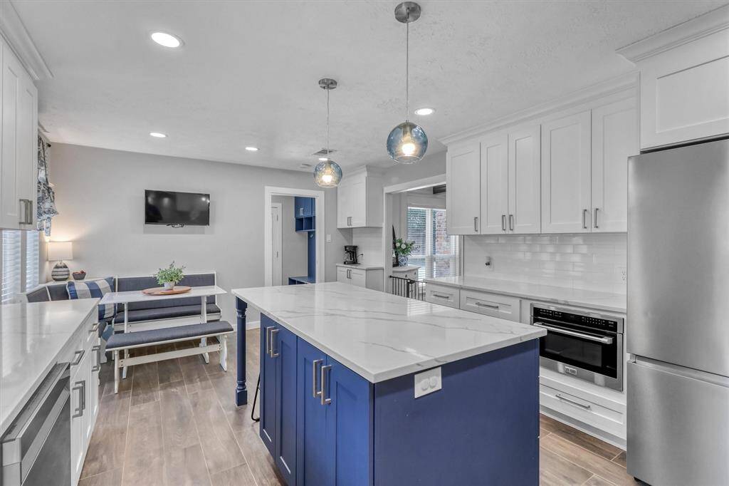Large Island with seating is the center of this stunning kitchen.
