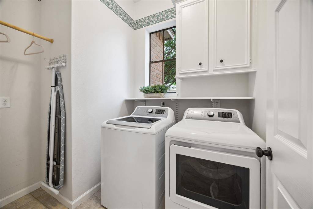 The primary suite offers double sinks, jetted tub, separate shower and huge walk-in closet to make your morning routine seamless.
