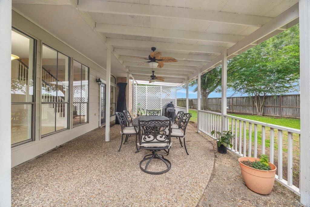 Outside, watch the birds fly by from your charming covered patio in your massive backyard with NO BACK NEIGHBORS.
