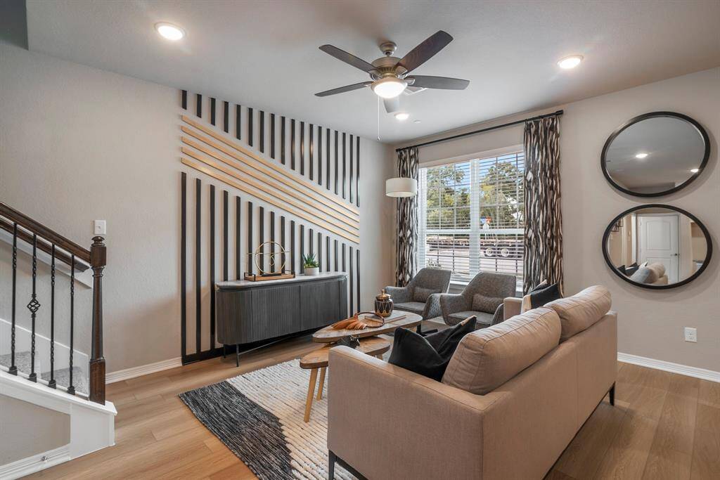 Representative photo of the Houston floorplan by History Maker Homes, living room area, approximate completion date is June 2025