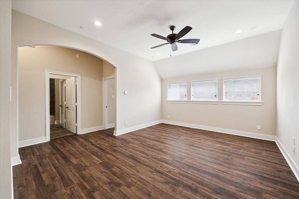 Game room view #2.  Two bedrooms throught the hallway (left and right).