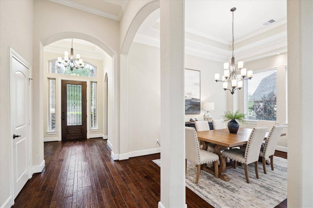 Second view of the entry with the formal dining room to the right.