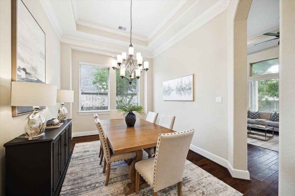 Formal dining room view #2.  Please notice the handsome coffered ceiling and crown molding.