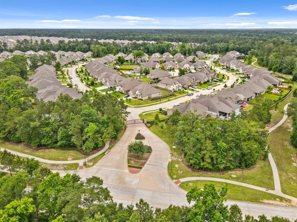 Nestled within Tavola, this gated enclave features scenic pathways winding through lush wooded areas, offering a serene and secure environment.