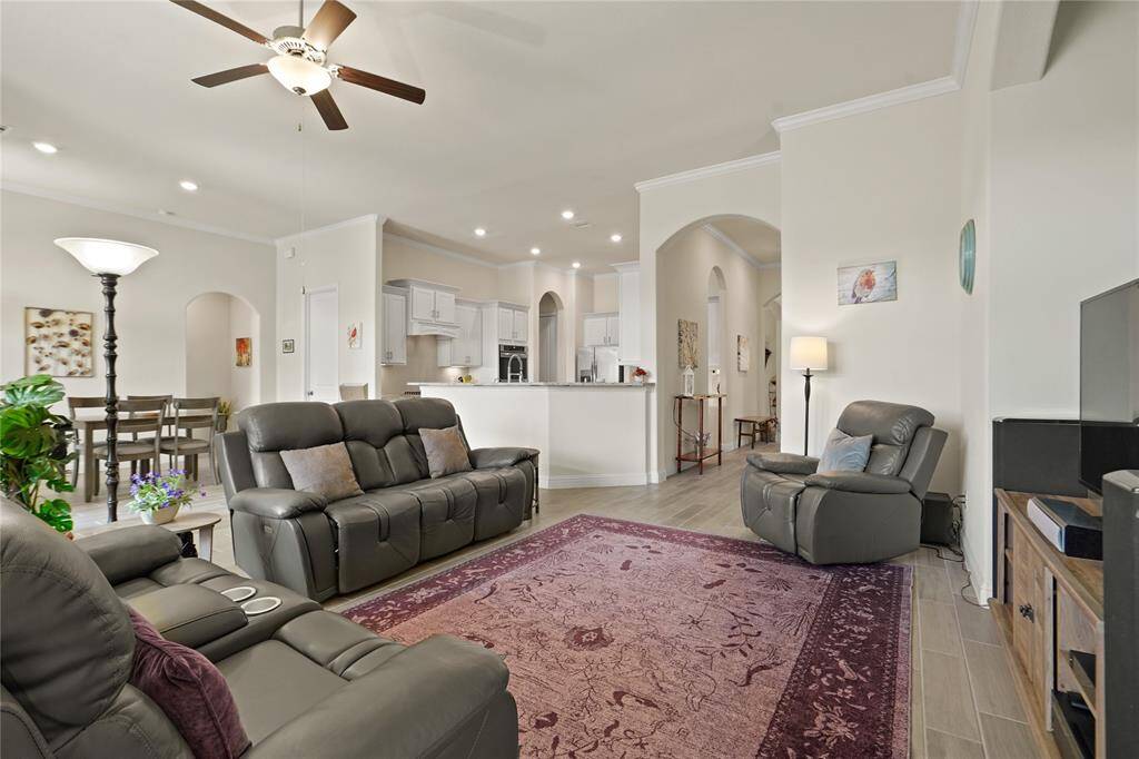 Experience the seamless flow of the open floor plan from this living room view.