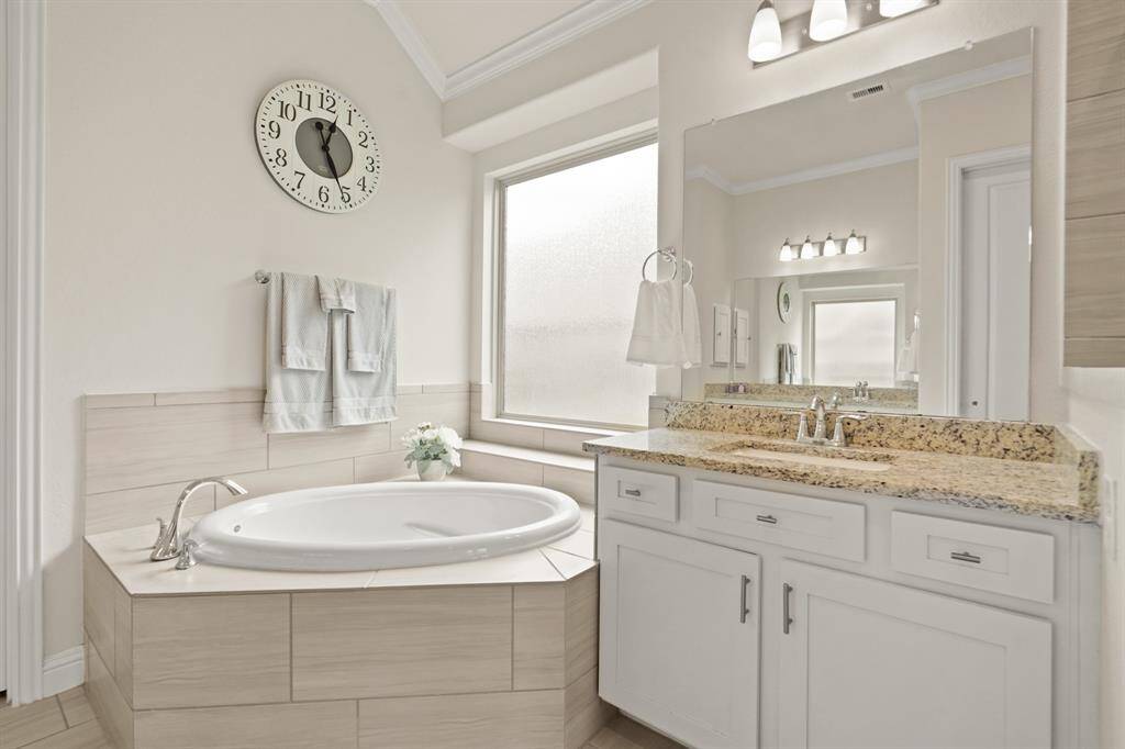 Indulge in relaxation with a luxurious soaking tub, perfect for unwinding.