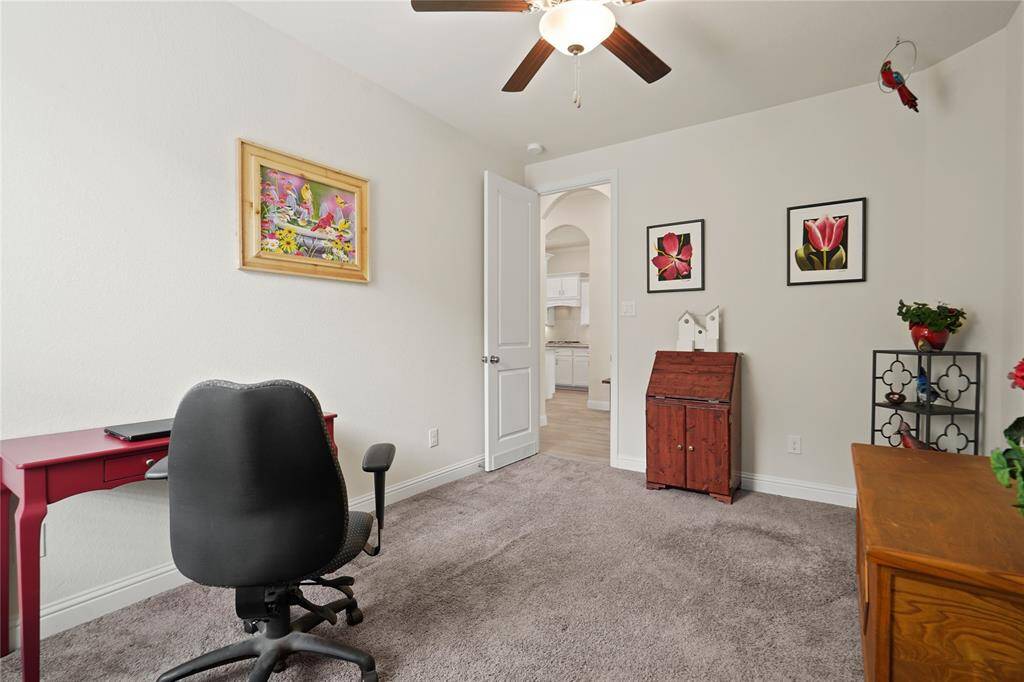 Discover the charm of this secondary bedroom featuring a spacious walk-in closet.