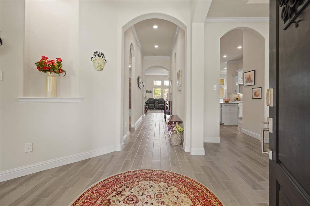 Experience the spacious elegance of this home with its open floor plan visible right from the foyer.
