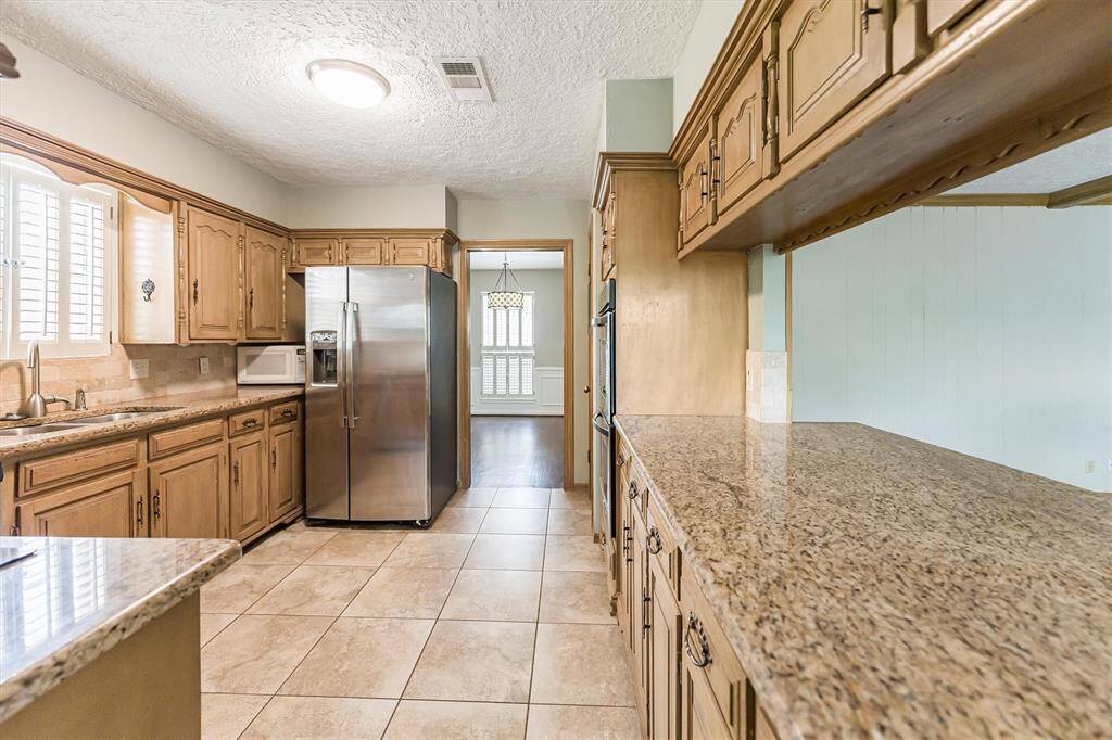 Access the formal dining room directly from the kitchen