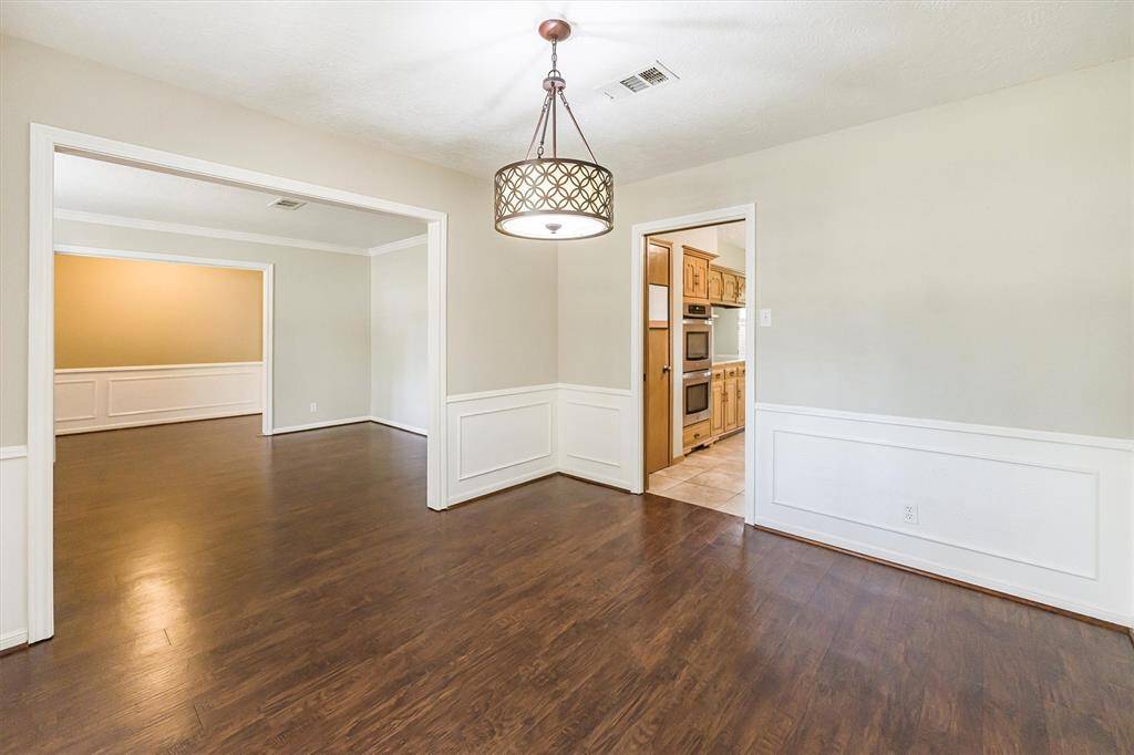 Formal dining and living rooms at the front of the home