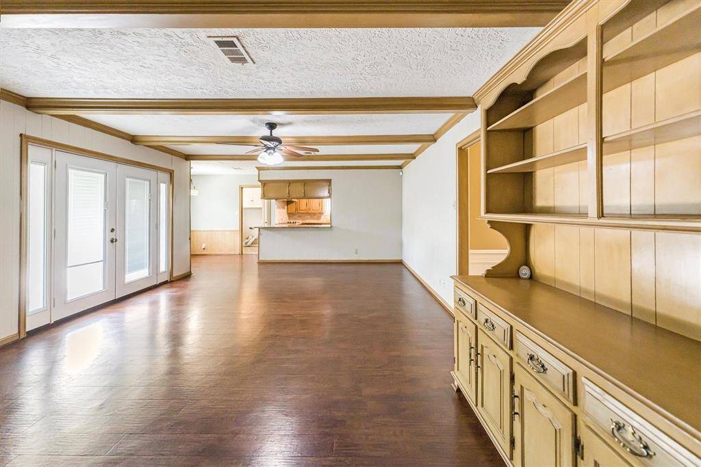 Built in shelving and cabinetry provide convenient storage
