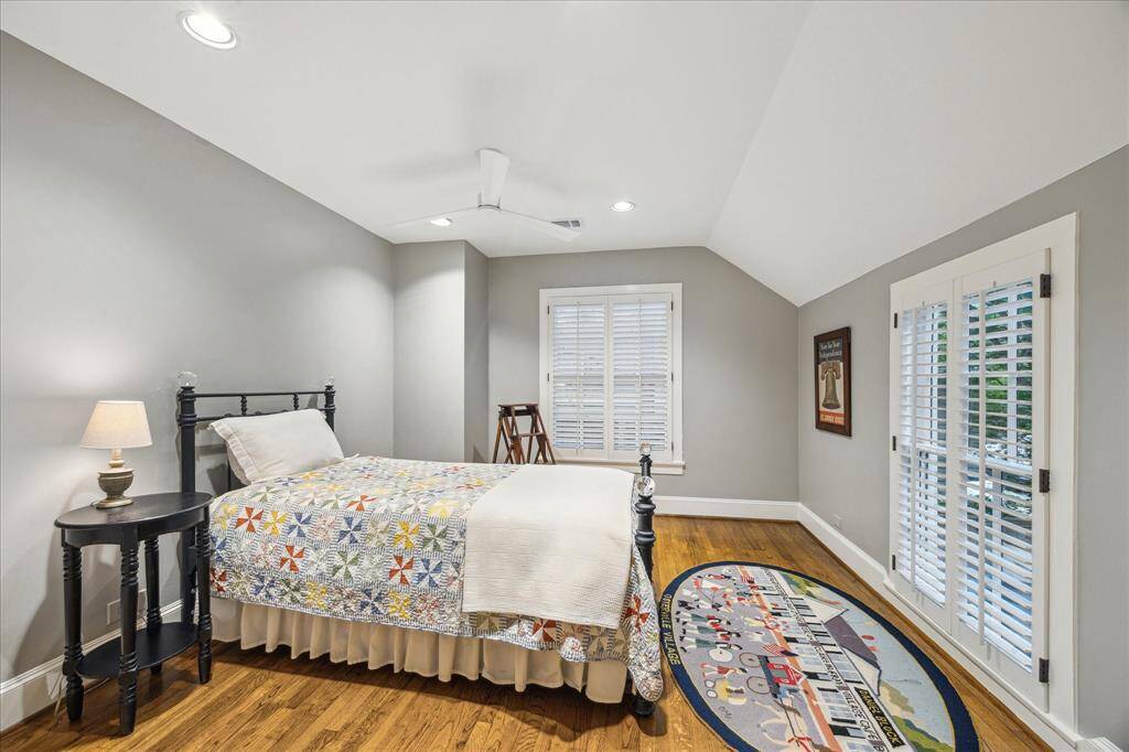 Bedroom #2- Larger secondary bedroom which overlooks the front of the home. It has multiple windows, recessed lighting, ceiling fan and closet.