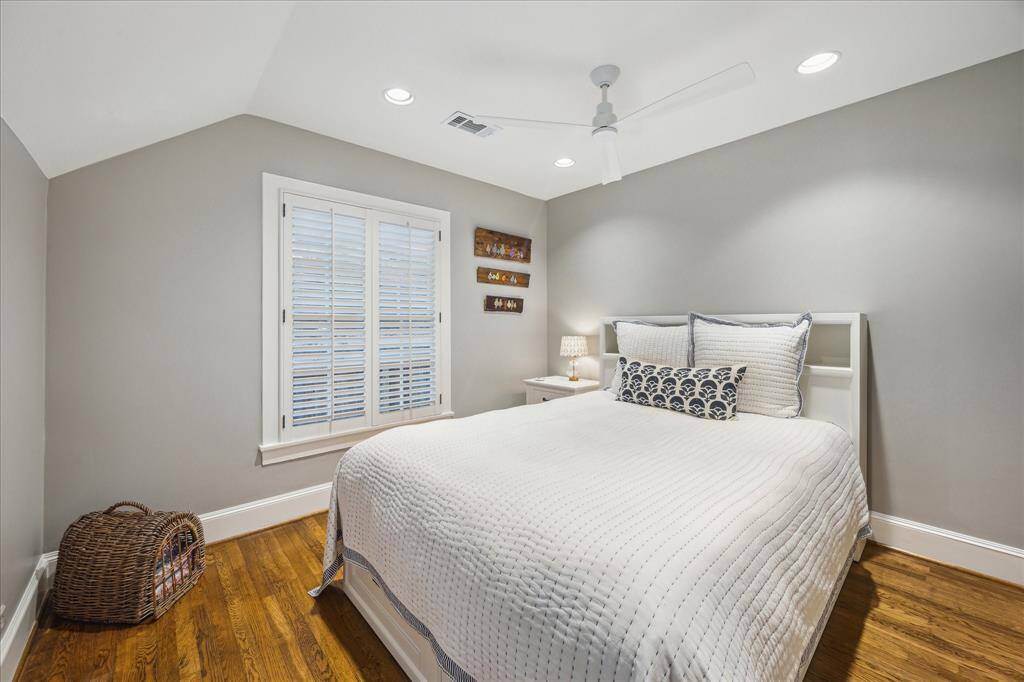 Bedroom #3- A cozy and comfortable bedroom with hardwoods, ceiling fan, recessed lighting and closet.