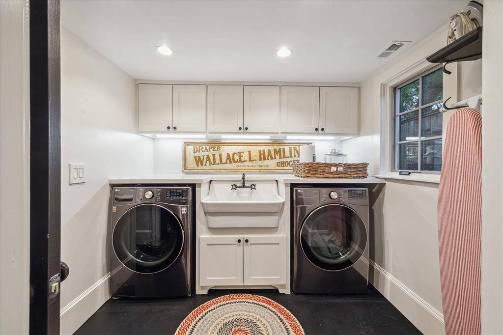 Utility Room-Samsung washer and dryer stay.