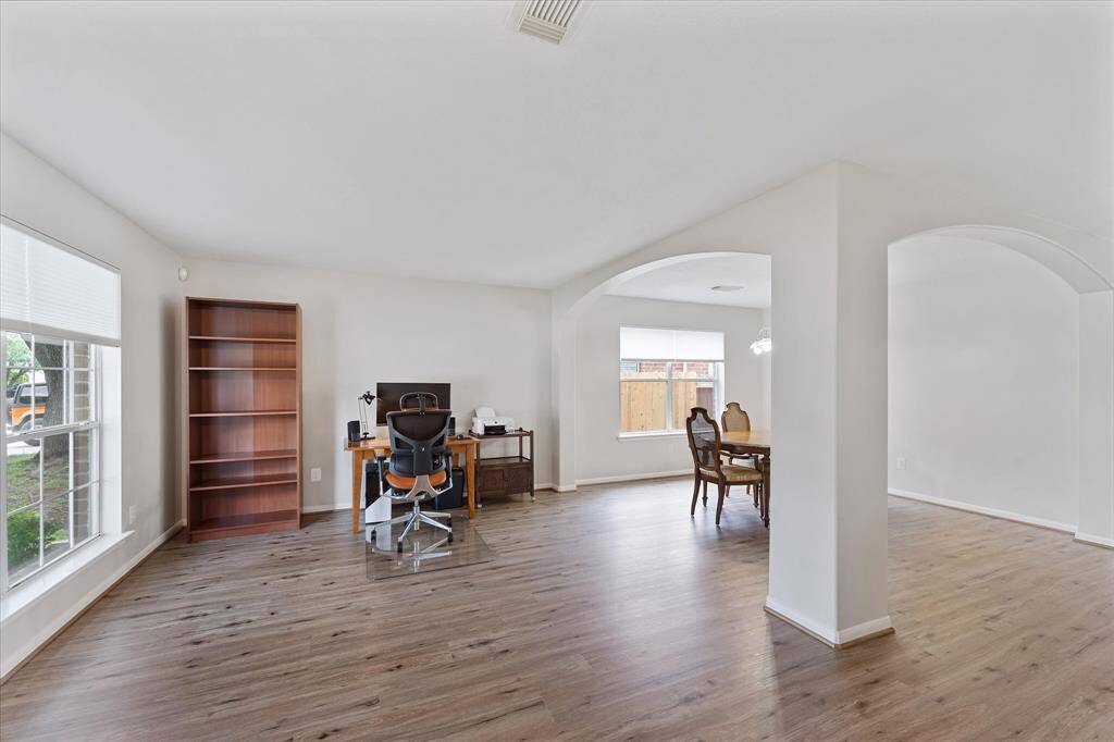 The front entry space has endless options. Formal dining, formal living, office & more.
