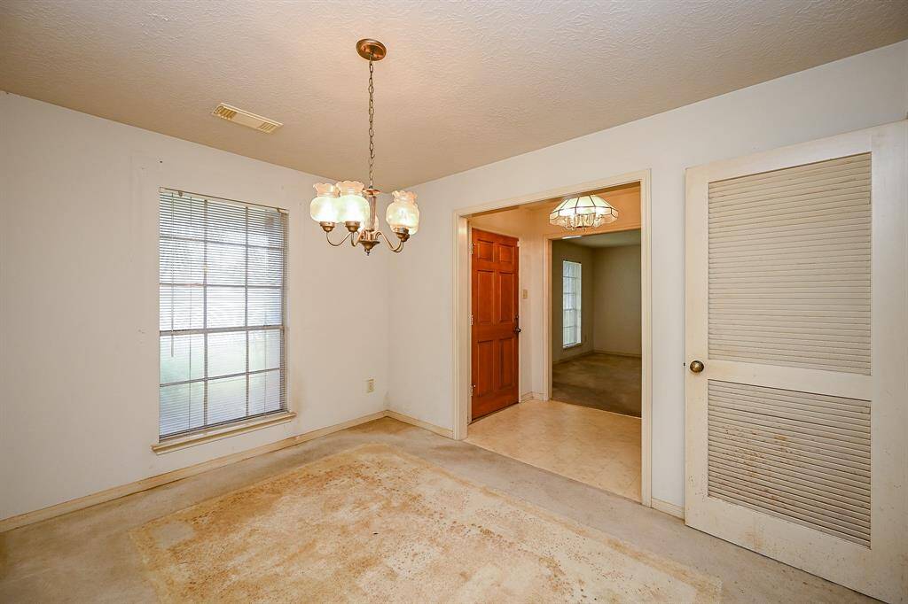 The Formal Dining Room is spacious and can accommodate a large table and buffet or hutch.