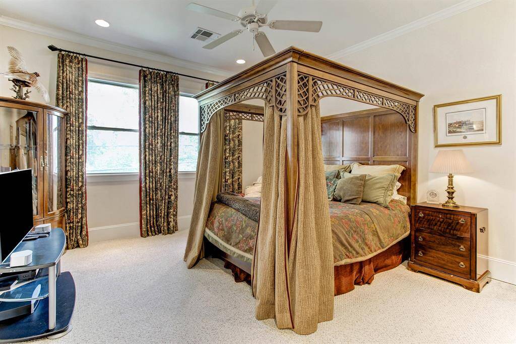 1 of 3 generously sized secondary bedrooms with ensuite bath.