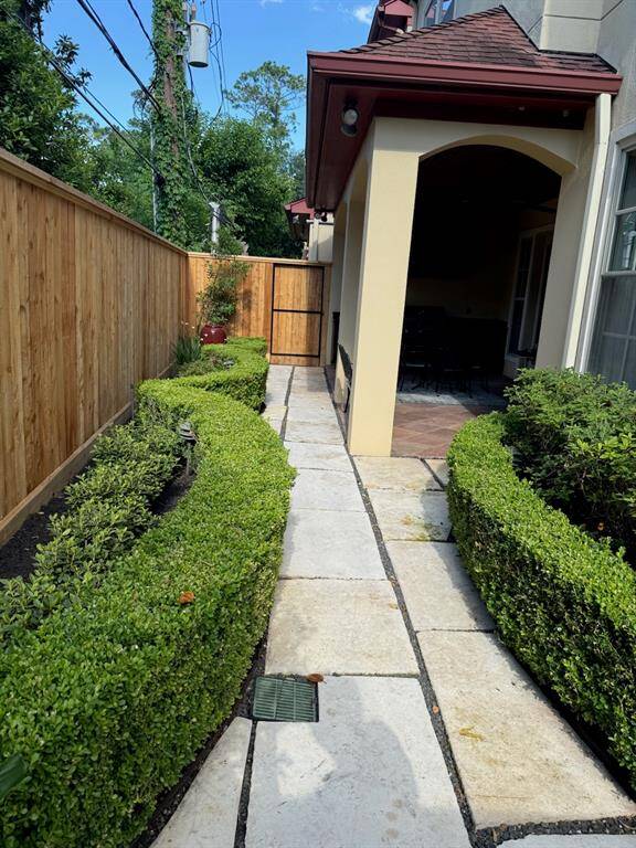 View of the courtyard showing the recent wood fence.