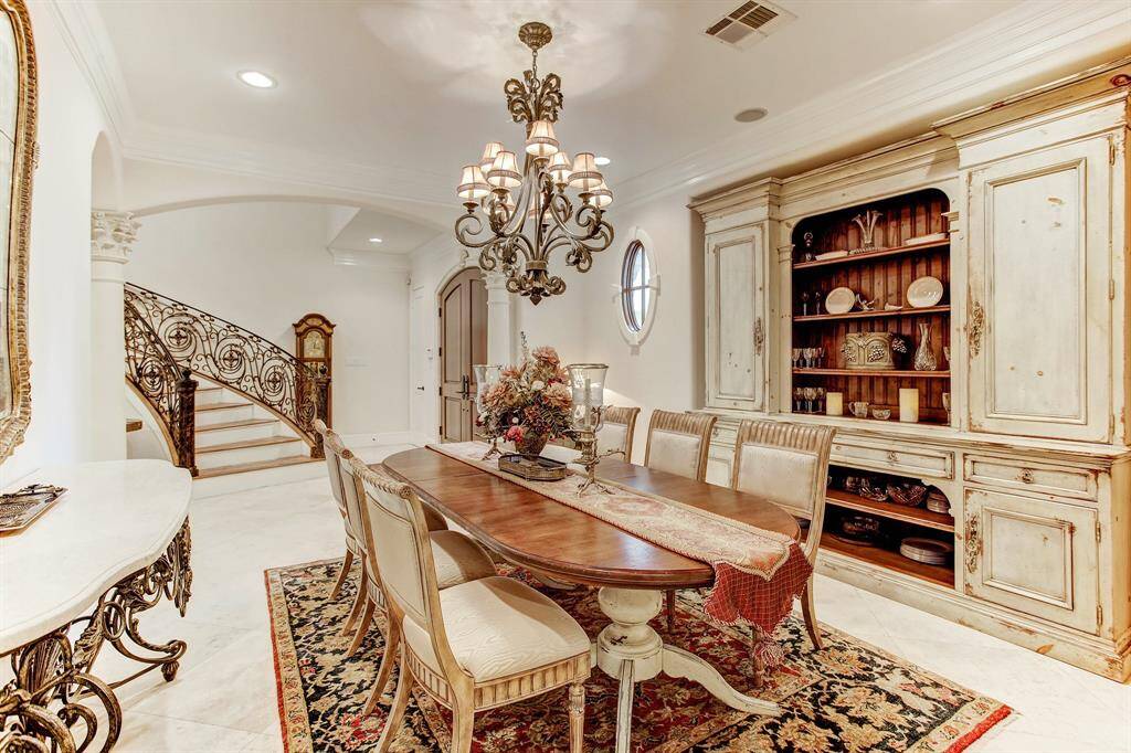 The formal dining room is to the left of the entry and is quite large for entertaining for those gourmet dinner parties or family events.  There is wonderful wall space for decorative mirrors and art.