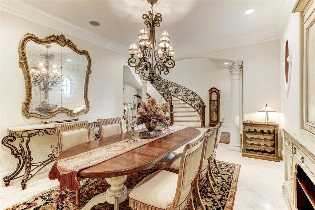 Another view of the dining room with the butlers pantry beyond.